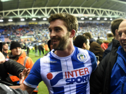 FA Cup hero Grigg revels in dousing Manchester City