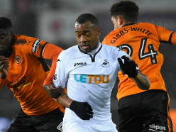 Swansea City’s Carlos Carvalhal salutes Jordan Ayew