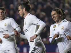 Diving after Barca! Lucky Madrid keep title hopes alive with win over Levante